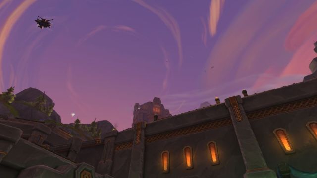 Dornogal city in World of Warcraft with a purple sky and swirling clouds.